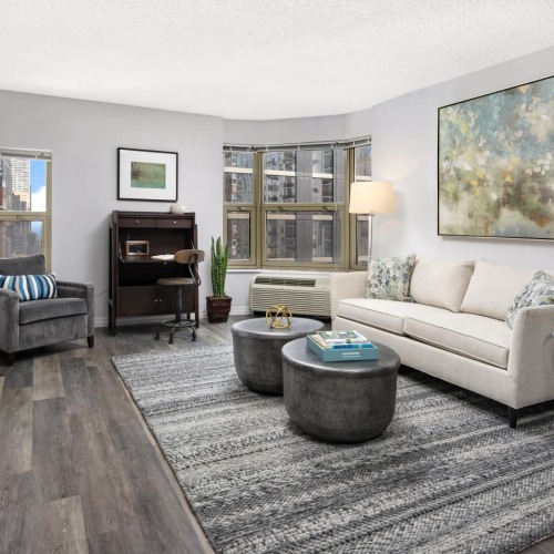 Generous living spaces to relax and unwind spacious living room with windows